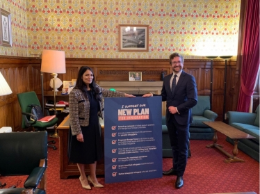 Alexander Stafford with Priti Patel in a Parliament office